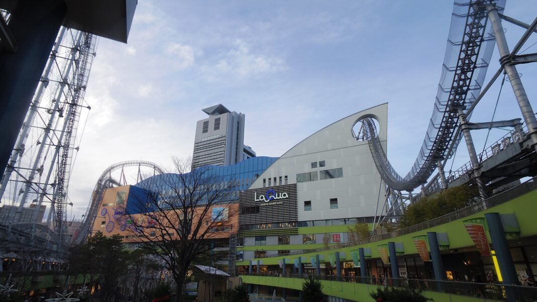 Tokyo Dome City's LaQua complex with its roller coaster, home of the ASOBONO! indoor play facility